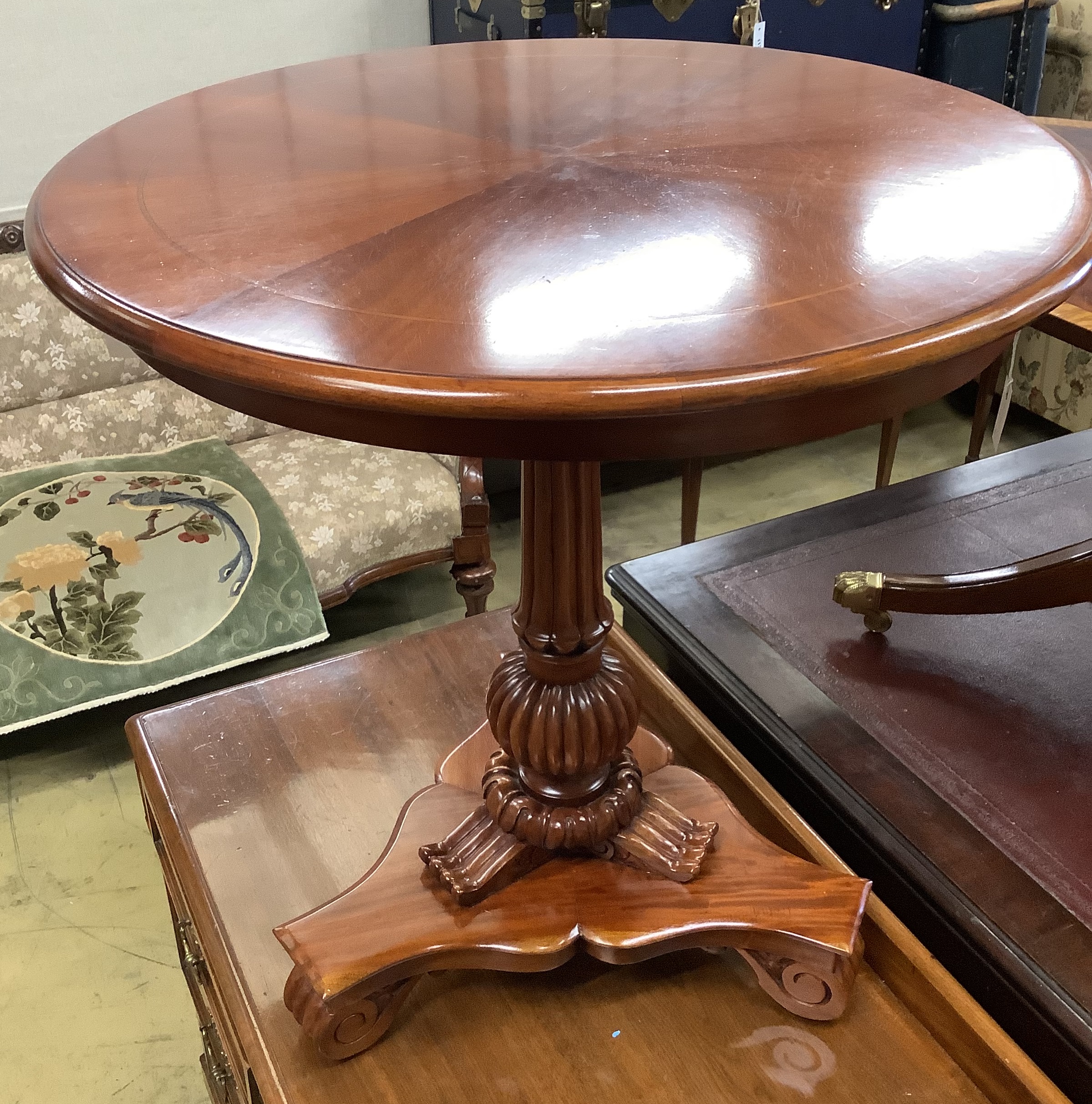 A William IV style mahogany tilt-top centre table